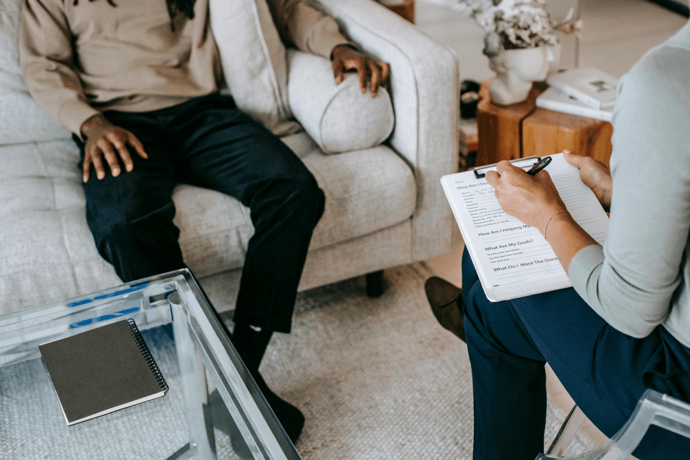Therapist consulting with patient