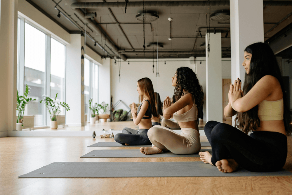 Wellness coach leading yoga session
